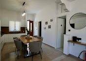 Dining, archway - BellaDiAnna Apartment